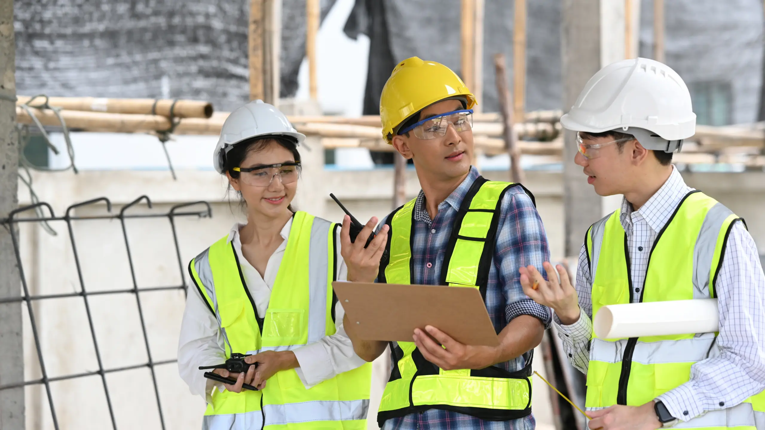 Construction professionals discussing workplace safety